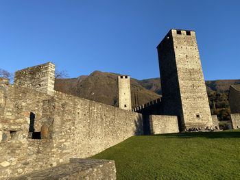 Low angle view of fort against blue sky