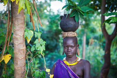 Portrait of statue against trees