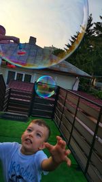 High angle view of boy at bubbles