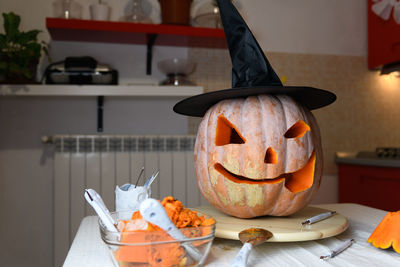 Close-up of jack o lantern on table