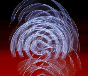 Close-up of light trails against black background