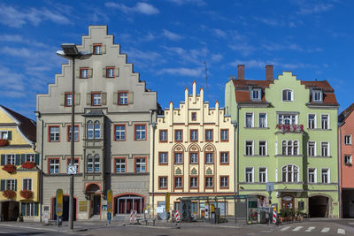 Historic houses on arnulf square in regensburg, germany