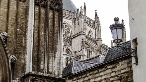 Low angle view of ornate building against sky