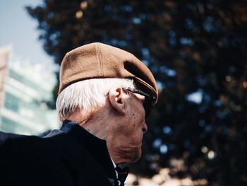 Portrait of man wearing hat outdoors