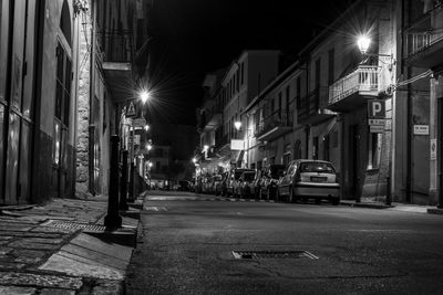 Illuminated street at night