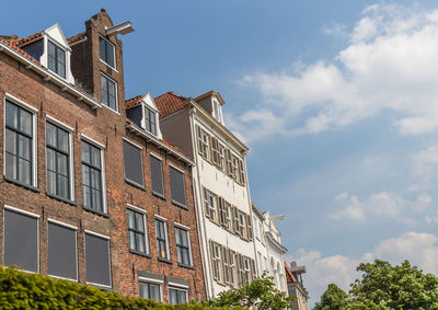 Low angle view of residential building against sky