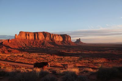 Scenic view of rock formations against sky