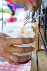 Close-up of man preparing food