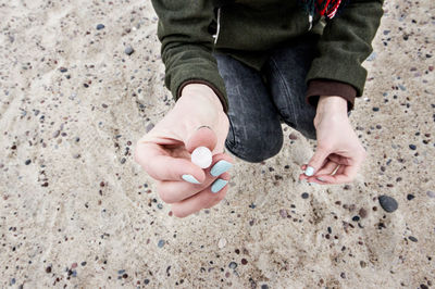 Low section of woman on beach