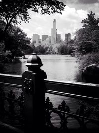 River in city against sky