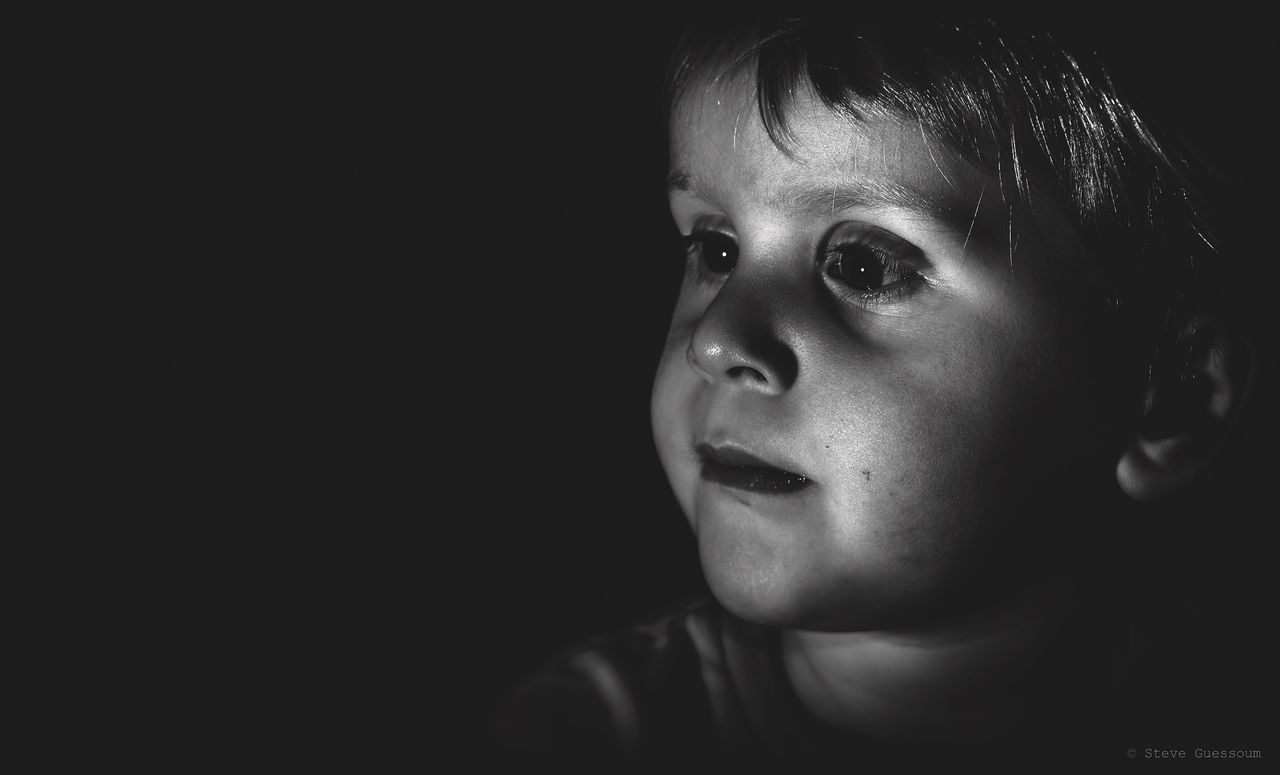 PORTRAIT OF BOY LOOKING AWAY