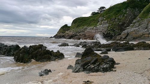 Scenic view of beach against sky