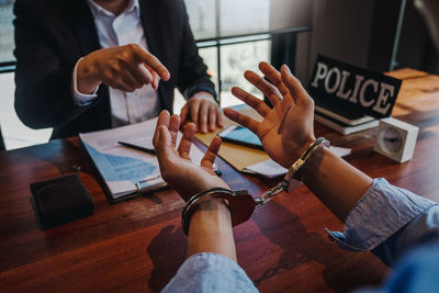 High angle view of people on table