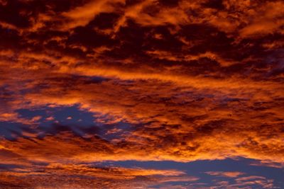 Scenic view of dramatic sky during sunset