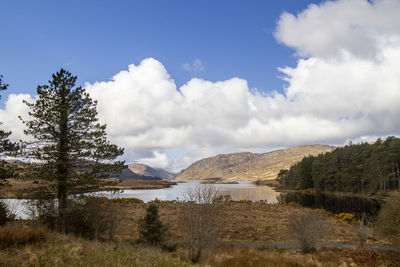 Panoramic view of landscape against cloudy sky