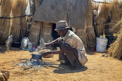 Side view of man working