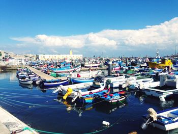 High angle view of boats moored in harbor