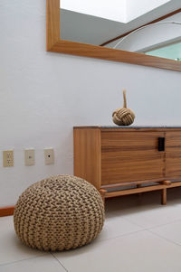 Wooden credenza, buffet with natural stone on the deck