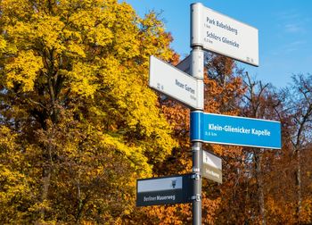 Information sign against trees