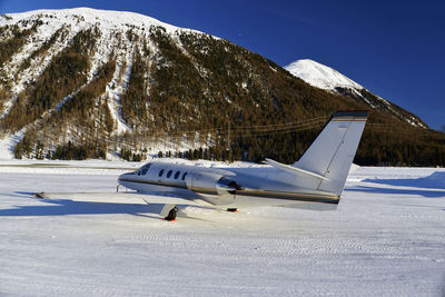 Private jets and aircrafts in the airport of engadine st moritz in winter time