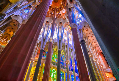 Low angle view of illuminated lights in building