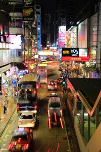 Cars on street in city at night