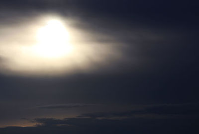 Low angle view of sun in sky