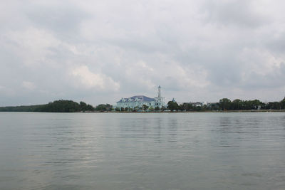 View of lake against cloudy sky