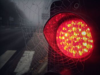 Close-up of illuminated red light