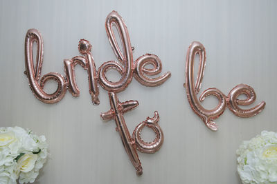 High angle view of text on white wall