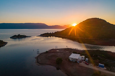 High angle view of lake against sky during sunset