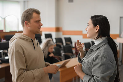 Side view of young couple