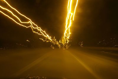 Light trails on road at night