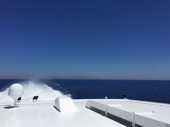 Scenic view of sea seen from boat deck during sunny day