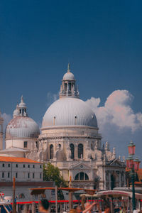 View of buildings in city against sky