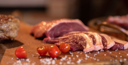 Close-up of meat on cutting board