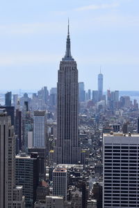 Modern buildings in city against sky