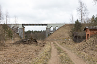 View of bridge over road against sky