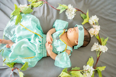 High angle view of mother and daughter on floor