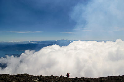 Panoramic view of landscape against blue sky