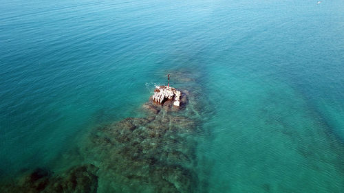 High angle view, small rock in the midle of the sea
