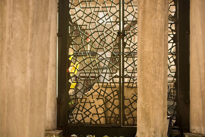 Metal gate against building