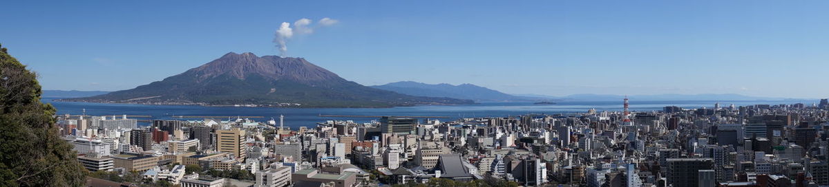 Panoramic view of sea and buildings in city