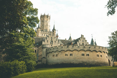 Low angle view of historical building against sky