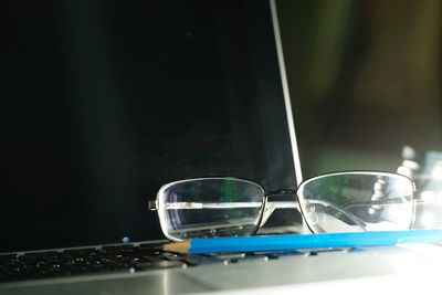 Close-up of sunglasses on table