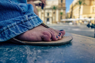 Close-up of the foot of a woman