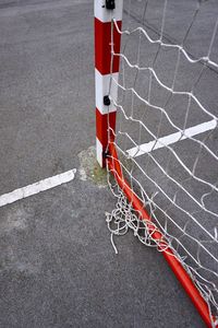 Old goal sport equipment with rope net on the street, street soccer in bilbao spain