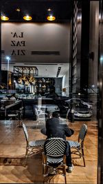 Empty chairs and table in restaurant