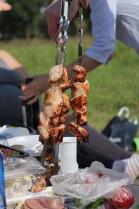 Close-up of hand holding ice cream