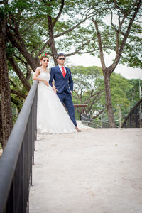 Couple walking in park